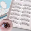 Cílios falsos 10 pares de cílios falsos coreanos finos cílios secos transparentes simulação natural de cílios artesanais em forma de U Ferramenta de maquiagem para iniciantes D240508