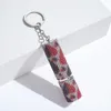 Keychains Woman Designer Key Chain Accessoires Keberen vol met diamant parfum dispenser fles compact essentie sleutelhanger draagbaar met druk op spray -toetsringen