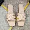 Designerskie kapcie hołd gumowe zjeżdżalnie skórzane płaskie obcasy Claquette dla kobiet damskich letnich butów na zewnątrz sandały sandały piaskowce klapki klapki dh bramka