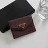 Bolsa de órganos, billetera de cuero con estampado cruzado, cambio para hombres y mujeres, estilo corto de mujeres de alta gama, minimalista