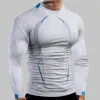 T-shirts pour hommes Spring et été élevé élasticité haute élasticité respirante à manches longues serrées imprimées rapides de fitness sec