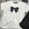 Nouvelles filles Habillement d'été Baby Tracksuit Kids Designer Clothes Taille 90-150 cm archet T-shirt décoré et jupe courte à paillettes brillantes 24mai