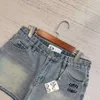 Qualidade do óleo do sul Loe24 Primavera/verão Novo bordado de contraste Padrão clássico Cantura alta shorts jeans macios para mulheres