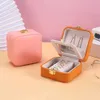 Scatole di gioielli scatole di gioielli portatili con serratura a specchio per orecchini anelli di rivestimento da viaggio Visualizza in pelle per la scatola dell'organizzatore di gioielli in pelle PU