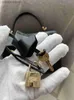 Классические дизайнерские пакеты Hremms Женщины подлинная кожаная портативная сумка Kelyy28 Кели Сумка с черным золотым внешним швом коробка