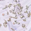 50pc Nail art de luxe aléatoire Jewelry Heart Bowknot Style mixte 3D Charmes Tassel Design Alloy 240509