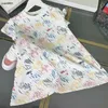 Beliebter Babyrock kurzärmelig Prinzessin Kleid Größe 100-160 cm Kinder Designer Kleidung Cartoon Graffiti Print Girls Party Dress 24APRIL