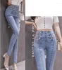 Jeans femininos Mulheres de peito duplo de peito magro de cintura chique de design de jeapis de jeapis de moda de moda de calça apertada