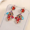 Orecchini per stalloni Evacandis Micro Inlays Flower Drop Drop Elegantemente lussuoso zirconia cubica Perla placcata in 18 K