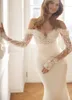 Élégants robes de mariée de sirène 2024 chérie hors de l'épaule perle des applications en dentelle de fleur