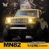 MN82 RC Crawler 1 12 Volledige schaal Pick -up Truck 24G 4WD Offroad Car Controleerbare koplampen Remote CONTROLE VEHUIER Model Kid Toy 240506