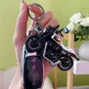Keychains Lanyards Ny simulering Mini Motorcykel Keychain Fashion Personlighet Racing Car Key Chain Unisex Motorcykel Model Toy Keyring Pendant J240509