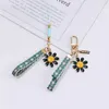 Keychains Lonyards Nouveaux réchauffes mignonnes mignonnes sweet tissu vert fleur keychain femmes biftectes clés clés sac de voiture pendante charmes ornement petite amie bijoux cadeau j240509