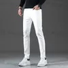 Designer de jeans masculino Spring New Jeans Men's Algody Stretch Slim Fit e White Youth calças