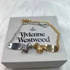 Sélectionnée Westwood New Pig Round Card Graved Saturn Bracelet Womens Womens Gold and Silver Sweet Personnalized Trendy Decoration Nail