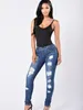 Kvinnors jeans 2024 design grossist damer sexig klocka botten staplade stretch mager plus size flare denim byxor rippade kvinnor