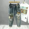 Jeans en détresse déchiré pour hommes streetwear patchwork trou de mode hip-hop Baggy décontracté harem rétro pantalon denim mâle 240429