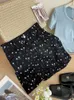 Kjolar kvinnor polka dot preppy denim kort hög midja kontor a-line kjolpaket höft bodycon mini 2024