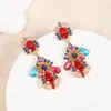 Orecchini per stalloni Evacandis Micro Inlays Flower Drop Drop Elegantemente lussuoso zirconia cubica Perla placcata in 18 K