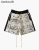 Rhude high -end designer shorts voor kleurblokbrief gebreide jacquard drawstring shorts geruite cashew flower casual capris voor mannen met 1: 1 originele labels