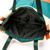 Sac à dos pour femme d'épaule féminine étanche en nylon en nylon léger messager extérieur messager pack de mode hipster de la rue de la mode