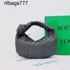 Borsa venetabottegs collezione all'inizio della primavera mini intrecciata jodie sacca vera pelle viola pieghetta