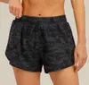 Femmes de yoga tenue camouflage Running shorts sports avec liner latérale poches de gymnase