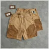 Herren-Shorts Persönlichkeit Sprühfarbe für alte Frachtshorts Herren Amerikaner Casual Farb Patchwork Fischknochen Nagel losen gerade Hose mit mittlerer Leg Y240507