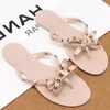 Designer tofflor Summer Women Beach Flip Flops Shoes Classic Quality Studded Ladies Cool Bow Knot Flat Slipper Female Rivet Jelly Sandals Shoes