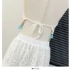 Zweiteiliger Kleid Boho Beach Damen Zwei Peice-Sets Häkeln hohl aus Neckholder Hals Rückenless Tops+unregelmäßige Schnürschnürröcke Set Dropshipping Y240508