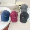 Caps Hats Childrens baseball cap retro washed cotton baseball cap spring summer baby sun protection cap Valentines Day heart-shaped printed adhesive cap d240509