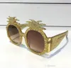 0150s zonnebrillen Gold Acetaatframe met ananas 0150 Designframe Populaire UV -bescherming Zonnebrillen Zonnebril Mode Zomer W9313357