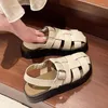 Chaussures décontractées baotou sandales féminines 2024 étudiant d'été tissage cage cochon cage plat fond rétro sable français femelle romaine