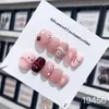 Różowa urocza ręcznie robiona prasa na paznokcie krótka okrągła urocza sztuka na gwoździe z sercem w Emmabeauty Storoem19456 240430
