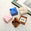 Scatole di gioielli all'ingrosso Bowknot Jewelry Box per orecchini Collana anello Gift Box Wedding Storage Solido Colore di cartone Besi di pacchetti di pacchetti