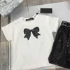 Beliebte Mädchen Kleid Kleider Sommerbaby Tracksuits Kinder Designer Kleidung Größe 90-150 cm Bug dekoriertes T-Shirt und glänzender kurzer Rock 24may 24may