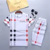 Mens Designers Tracksuit Set Running Fashion Men Tracksuits Plaid printing and pattern embroidery Clothing Track Kit Casual Sports Short sleeve suit Sportswear