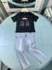 Marke Baby Tracksuits Summer Boys Jeans Set Kids Designer Kleidung Größe 100-150 cm kurzärmeliges T-Shirt und gewaschene Blue Jeans 24may