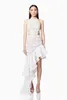 Design de robe française avec design floral tridimensionnel, ajustement slim, robe enveloppée de fesses, robe de vacances irrégulière pour femmes