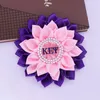 Broschen hergestellt lila rosa Seidenband Blume Corsage Griechische Gruppe Epsilon Psi Militärische Schwesternschaft Pin Brosche für Dame