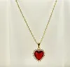 Colliers pendants Collier de coeur rouge or plaqué de zircone