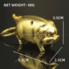 Jinzhucreative Golden Pig Nieuwjaars goederen metaal Ierenbare sleutelhanger Lichtere open vlam sigarettenaansteker sigaretten set groothandel