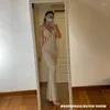 カジュアルドレス夏の女性のホリデーニット不規則な長いスカートスリングエレガントなセクシーなパーティーバックレスタイトな包帯ドレス