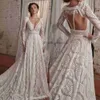 Robes de mariée de robe unique en dentelle à manches longues à manches détachables de corsage de corsage de balayage à glissière