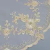 Tableau de table ronde de fleur beige couverture de mariée