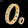 Collier Boucles d'oreilles Set Donia Jewelry Fashion Classic Classic Hollowed Flower Flower Titanium Steel Micro-Rend Zircon Creative Bracelet Ring