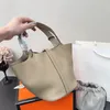 Sacchetto di lusso mini tote bot vera pelle in pelle da giardino capacità portatile cesto vegetale vegetale vera in pelle vera leva top a strato di mucca semplice e bella