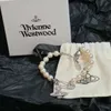 Charme Westwood Saturne Full Diamond Pin Pearl Bracelet Hollow High Version stéréoscopique