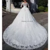 Off the Schulterspitze Brautkleider Applikationen Vestidos Mütze Ärmel Schnürung Rücken geschwollene Prinzessin Hochzeitskleider Dubai Designer Sweep Zug Rüschen Vestidos de Novia