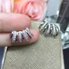 Boucles d'oreilles Stud Huitan Design à la mode Piercing pour les femmes avec des bijoux polyvalents pour filles modernes de pierre cz éblouissante